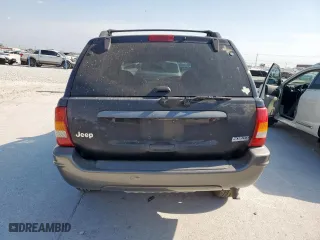 2004 Jeep Grand Cherokee Laredo with VIN 1J4GX48S24C303786, listed as a Copart auction lot 53482155 with 167,823 mi miles and Salvage Title. Bid and sale history available at carsss.com. Image 6.