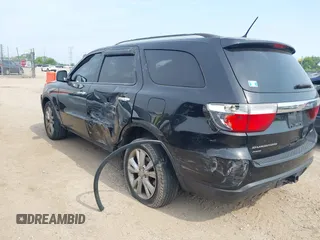 2013 Dodge Durango Crew z VIN 1C4RDJDG3DC685995, wystawiony jako IAAI lot #42490067 z przebiegiem 205 806 mil mil oraz . Historia ofert i sprzedaży dostępna na DreamBid. Obrazek 3.