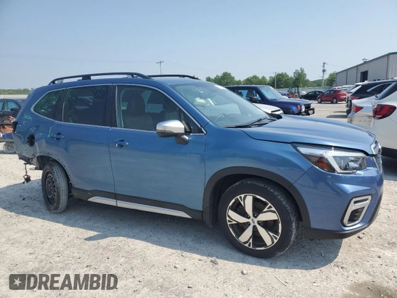 2021 Subaru Forester Touring with VIN JF2SKAXC4MH514225, listed as a Copart auction lot 60240355 with 55,660 mi miles and Salvage title. Bid and sale history available at DreamBid. Image 4.