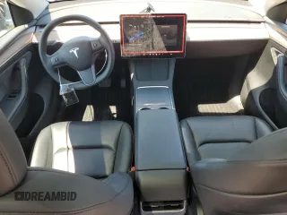 2024 Tesla Model Y z VIN 7SAYGDED9RF005104, wystawiony jako Copart lot #64974545 z przebiegiem 20 422 mil mil oraz Szkoda całkowita • Salvage title. Historia ofert i sprzedaży dostępna na DreamBid. Obrazek 8.
