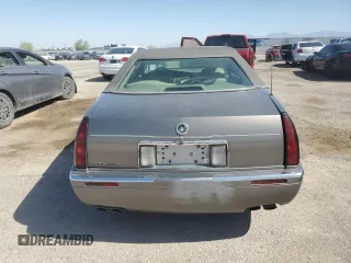1998 Cadillac Eldorado z VIN 1G6EL12YXWU610918, wystawiony jako Copart lot #57309075 z przebiegiem 168 228 mil mil oraz Szkoda całkowita • Salvage title. Historia ofert i sprzedaży dostępna na DreamBid. Obrazek 6.