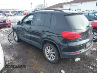 2017 Volkswagen Tiguan S with VIN WVGBV7AX7HK047973, listed as a IAAI auction lot 41197329 with 92,960 mi miles and . Bid and sale history available at DreamBid. Image 3.