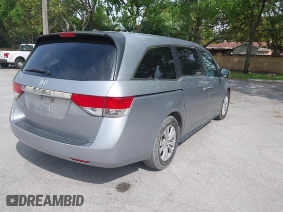 2017 Honda Odyssey EX-L with VIN 5FNRL5H66HB013840, listed as a IAAI auction lot 41768858 with 100,547 mi miles and . Bid and sale history available at DreamBid. Image 4.