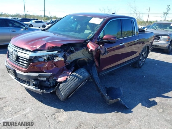 2019 Honda Ridgeline RTL-E with VIN 5FPYK3F72KB024461, listed as a IAAI auction lot 41813568 with 122,364 mi miles. Bid and sale history available at carsss.com. Image 2.