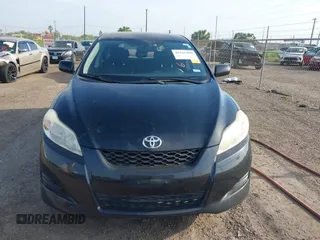 2009 Toyota Matrix with VIN 2T1KU40E69C091858, listed as a IAAI auction lot 41925490 with 153,161 mi miles. Bid and sale history available at carsss.com. Image 12.