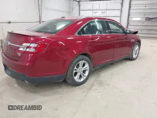 2015 Ford Taurus SEL z VIN 1FAHP2H88FG163179, wystawiony jako IAAI lot #42345579 z przebiegiem 142 424 mil mil oraz . Historia ofert i sprzedaży dostępna na DreamBid. Obrazek 4.