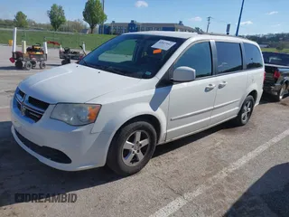 2013 Dodge Grand Caravan SXT with VIN 2C4RDGCG2DR522136, listed as a IAAI auction lot 42023561 with 176,635 mi miles and . Bid and sale history available at DreamBid. Image 19.