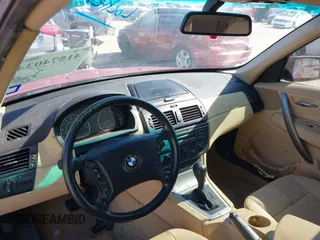 2005 BMW X3 2.5i with VIN WBXPA73495WC50768, listed as a IAAI auction lot 41574034 with 192,627 mi miles. Bid and sale history available at carsss.com. Image 13.