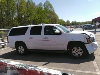 2014 Chevrolet Suburban LT with VIN 1GNSCJE05ER117663, listed as a IAAI auction lot 41992835 with 208,754 mi miles. Bid and sale history available at carsss.com. Image 13.