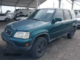 2000 Honda CR-V SE with VIN JHLRD1875YS022873, listed as a IAAI auction lot 42034984 with 210,853 mi miles. Bid and sale history available at carsss.com. Image 2.