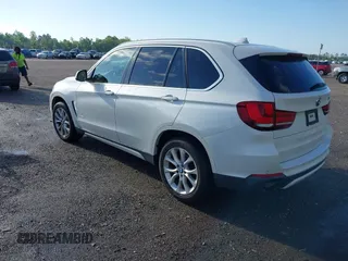 2015 BMW X5 xDrive35i z VIN 5UXKR0C53F0K58025, wystawiony jako IAAI lot #42222805 z przebiegiem 95 979 mil mil oraz . Historia ofert i sprzedaży dostępna na DreamBid. Obrazek 3.