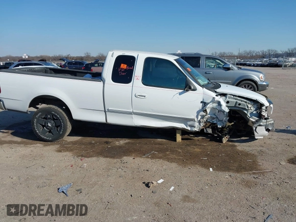 1999 Ford F-150 XL with VIN 1FTRX17L0XKB96416, listed as a IAAI auction lot 41333031 with Not Provided miles. Bid and sale history available at carsss.com. Image 14.