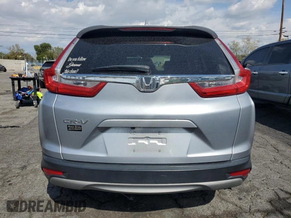 2019 Honda CR-V EX z VIN 5J6RW1H56KA035208, wystawiony jako Copart lot #51822295 z przebiegiem 82 813 mil mil oraz Szkoda całkowita • Salvage title. Historia ofert i sprzedaży dostępna na DreamBid. Obrazek 6.
