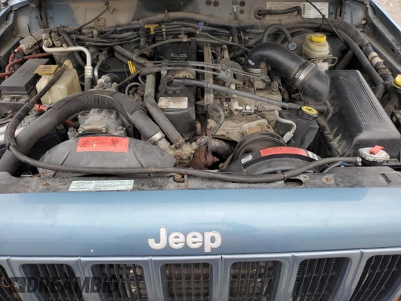 1999 Jeep Cherokee Sport with VIN 1J4FF68S4XL567848, listed as a Copart auction lot 43222045 with 280,178 mi miles and Salvage title. Bid and sale history available at DreamBid. Image 11.