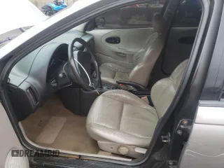 1996 Saturn SL with VIN 1G8ZK5272TZ265571, listed as a Copart auction lot 51267475 with 142,824 mi miles and Salvage Title. Bid and sale history available at carsss.com. Image 7.