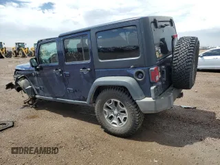 2013 Jeep Wrangler Unlimited Rubicon with VIN 1C4BJWFG5DL572795, listed as a Copart auction lot 62132425 with 149,695 mi miles and Salvage title. Bid and sale history available at DreamBid. Image 2.