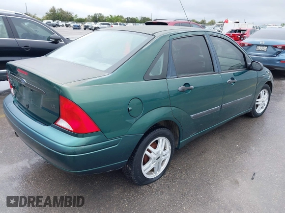2000 Ford Focus LX with VIN 1FAFP33P8YW336316, listed as a IAAI auction lot 41904496 with 215,100 mi miles and . Bid and sale history available at carsss.com. Image 4.