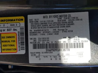 2018 Ford Fusion Titanium with VIN 3FA6P0D95JR138770, listed as a IAAI auction lot 41411388 with 107,540 mi miles. Bid and sale history available at carsss.com. Image 9.