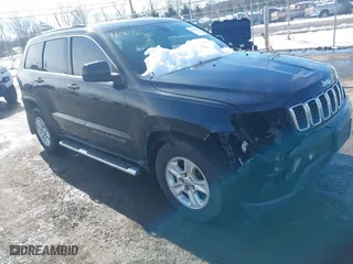 2017 Jeep Grand Cherokee Laredo with VIN 1C4RJEAGXHC685888, listed as a IAAI auction lot 41563643 with 193,997 mi miles. Bid and sale history available at carsss.com. Image 1.