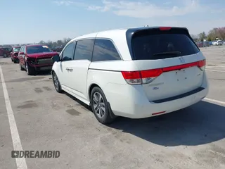 2016 Honda Odyssey Touring Elite with VIN 5FNRL5H97GB044278, listed as a IAAI auction lot 42056101 with 182,396 mi miles and . Bid and sale history available at DreamBid. Image 3.