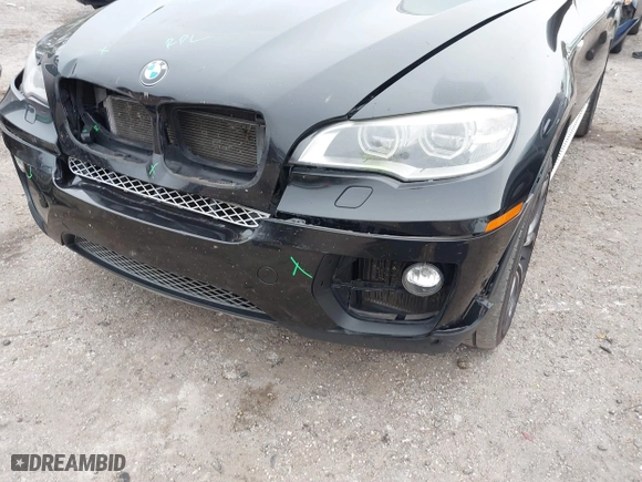 2014 BMW X6 50i with VIN 5UXFG8C54EL593152, listed as a IAAI auction lot 41439576 with 147,817 mi miles. Bid and sale history available at carsss.com. Image 6.