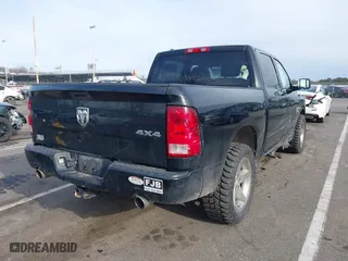 2014 Ram 1500 Express with VIN 1C6RR7KTXES331605, listed as a IAAI auction lot 41618433 with 137,906 mi miles. Bid and sale history available at carsss.com. Image 4.