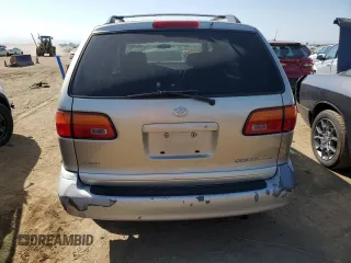 2000 Toyota Sienna LE with VIN 4T3ZF13C3YU229328, listed as a Copart auction lot 70880244 with 201,464 mi miles and Salvage Title. Bid and sale history available at carsss.com. Image 6.