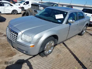 2006 Chrysler 300 Touring with VIN 2C3KA53G86H111027, listed as a IAAI auction lot 41870312 with 59,870 mi miles. Bid and sale history available at carsss.com. Image 17.
