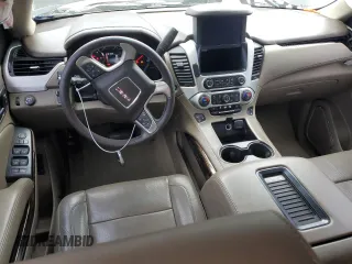 2015 GMC Yukon SLT with VIN 1GKS1BKC1FR615562, listed as a Copart auction lot 46374135 with 141,207 mi miles and Salvage Title. Bid and sale history available at carsss.com. Image 8.