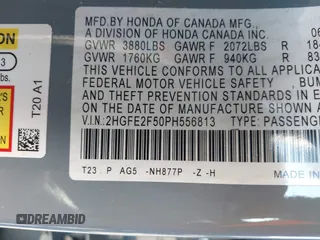 2023 Honda Civic Sport z VIN 2HGFE2F50PH556813, wystawiony jako IAAI lot #41364523 z przebiegiem 8 999 mil mil oraz . Historia ofert i sprzedaży dostępna na DreamBid. Obrazek 9.