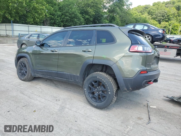 2021 Jeep Cherokee Trailhawk z VIN 1C4PJMBX0MD185078, wystawiony jako Copart lot #63264765 z przebiegiem 92 393 mil mil oraz Szkoda całkowita • Salvage title. Historia ofert i sprzedaży dostępna na DreamBid. Obrazek 2.