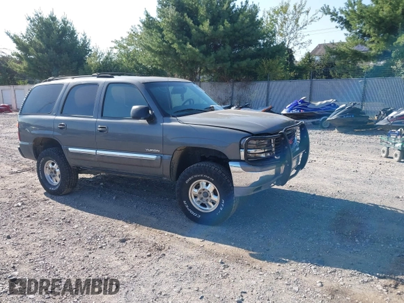 2002 GMC Yukon SLT z VIN 1GKEK13Z42J299221, wystawiony jako IAAI lot #40302959 z przebiegiem 260 096 mil mil oraz . Historia ofert i sprzedaży dostępna na DreamBid. Obrazek 1.