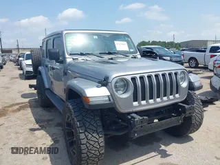 2021 Jeep Wrangler Unlimited High Altitude z VIN 1C4HJXEG3MW511185, wystawiony jako IAAI lot #42125883 z przebiegiem 45 564 mil mil oraz . Historia ofert i sprzedaży dostępna na DreamBid. Obrazek 1.