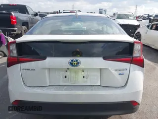 2021 Toyota Prius L Eco with VIN JTDKAMFUXM3144845, listed as a IAAI auction lot 41358306 with Not provided miles and . Bid and sale history available at DreamBid. Image 16.