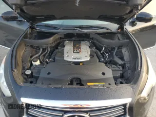 2014 Infiniti QX70 with VIN JN8CS1MU9EM450664, listed as a Copart auction lot 50768775 with 121,566 mi miles and Salvage Title. Bid and sale history available at DreamBid. Image 12.