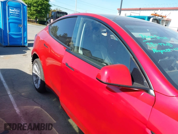 2023 Tesla Model Y Long Range with VIN 7SAYGDEEXPA182702, listed as a IAAI auction lot 42023730 with Not provided miles and . Bid and sale history available at DreamBid. Image 13.