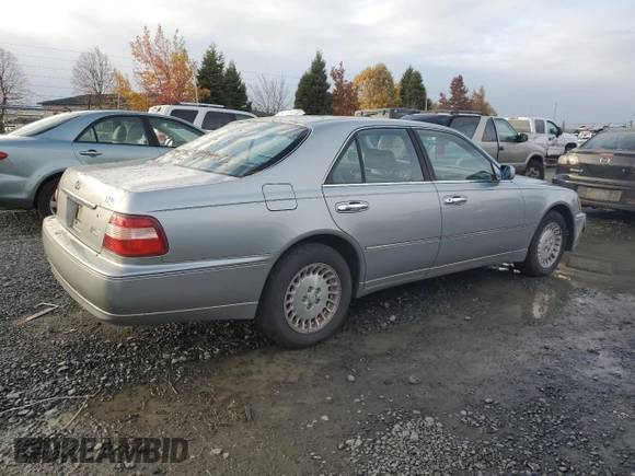1999 Infiniti Q45 z VIN JNKBY31A3XM602869, wystawiony jako Copart lot #78799354 z przebiegiem 189 083 mil mil oraz Szkoda całkowita • Salvage title. Historia ofert i sprzedaży dostępna na DreamBid. Obrazek 3.