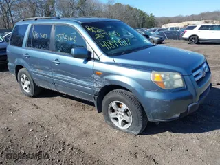 2006 Honda Pilot EX-L with VIN 5FNYF18536B017084, listed as a IAAI auction lot 41899517 with 999,999 mi miles. Bid and sale history available at carsss.com. Image 1.