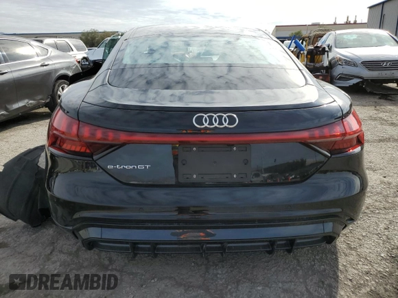 2023 Audi e-tron GT Premium Plus z VIN WAUFJBFWXP7003131, wystawiony jako Copart lot #38763864 z przebiegiem 16 636 mil mil oraz . Historia ofert i sprzedaży dostępna na DreamBid. Obrazek 6.