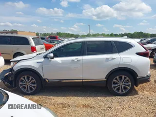 2022 Honda CR-V Touring z VIN 5J6RT6H93NL038701, wystawiony jako IAAI lot #42097294 z przebiegiem 55 402 mil mil oraz . Historia ofert i sprzedaży dostępna na DreamBid. Obrazek 14.