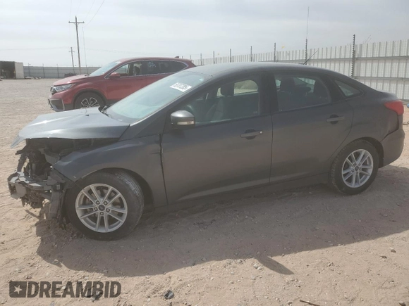 2017 Ford Focus SE with VIN 1FADP3F21HL308222, listed as a Copart auction lot 50707285 with 87,111 mi miles and Salvage title. Bid and sale history available at DreamBid. Image 1.