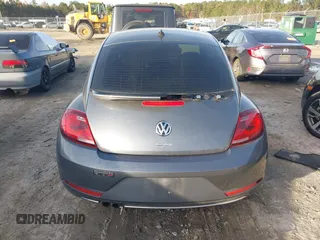 2017 Volkswagen Beetle 1.8T SE with VIN 3VWJ17AT5HM615698, listed as a IAAI auction lot 41099515 with 26,111 mi miles. Bid and sale history available at carsss.com. Image 16.