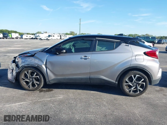 2019 Toyota C-HR XLE with VIN NMTKHMBX4KR082574, listed as a IAAI auction lot 41694921 with 61,777 mi miles and . Bid and sale history available at DreamBid. Image 14.