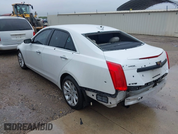 2015 Cadillac CTS Luxury RWD z VIN 1G6AR5S32F0123986, wystawiony jako IAAI lot #41853734 z przebiegiem 108 043 mil mil oraz . Historia ofert i sprzedaży dostępna na DreamBid. Obrazek 3.