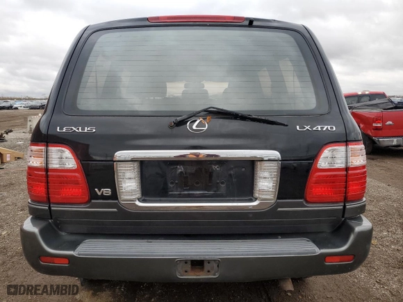 2003 Lexus LX 470 with VIN JTJHT00W333526380, listed as a Copart auction lot 77356534 with 151,636 mi miles and Salvage Title. Bid and sale history available at carsss.com. Image 6.