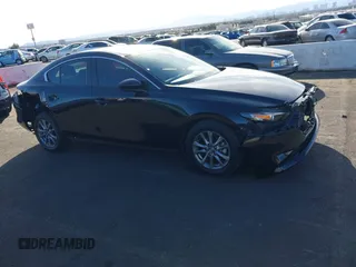 2021 Mazda 3 S z VIN JM1BPAAL8M1321402, wystawiony jako IAAI lot #41693911 z przebiegiem 35 144 mil mil oraz . Historia ofert i sprzedaży dostępna na DreamBid. Obrazek 14.