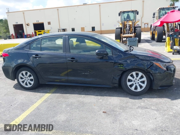 2023 Toyota Corolla LE with VIN JTDB4MEE2PJ004869, listed as a IAAI auction lot 42139964 with 41,119 mi miles. Bid and sale history available at carsss.com. Image 13.