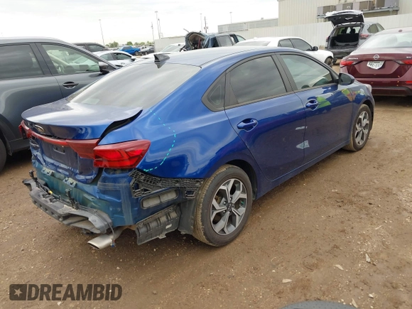2021 Kia Forte LXS with VIN 3KPF24AD0ME288497, listed as a IAAI auction lot 41888110 with 71,646 mi miles and . Bid and sale history available at DreamBid. Image 4.