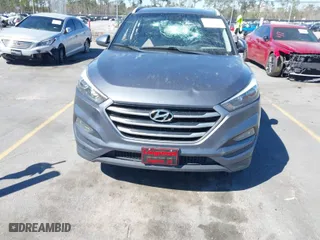 2018 Hyundai Tucson SEL with VIN KM8J3CA48JU718402, listed as a IAAI auction lot 41810363 with 218,853 mi miles. Bid and sale history available at carsss.com. Image 12.
