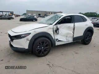2023 Mazda CX-30 Premium with VIN 3MVDMBDY4PM542533, listed as a Copart auction lot 57414845 with 4,427 mi miles and Salvage title. Bid and sale history available at DreamBid. Image 1.